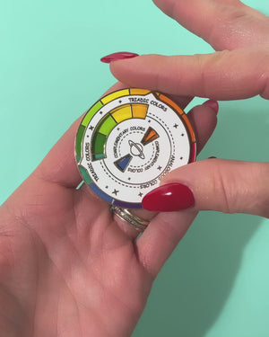 
            
                Load and play video in Gallery viewer, White Complementary Colors Spinning Diagram Enamel Pin
            
        